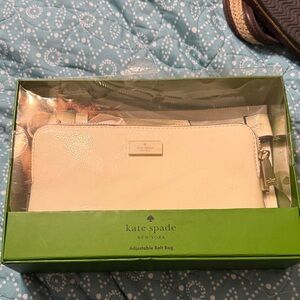 kate spade ivory leather belt bag with gold-tone plaque